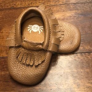 Tan moccasins
